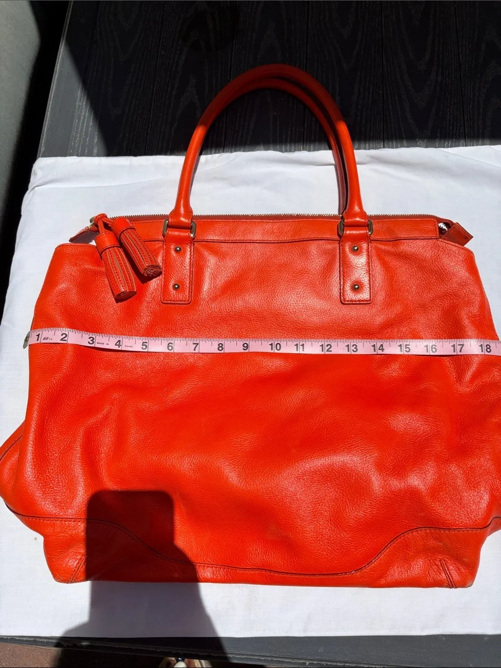 kate spade Bright Orange Leather Tote with Tassel